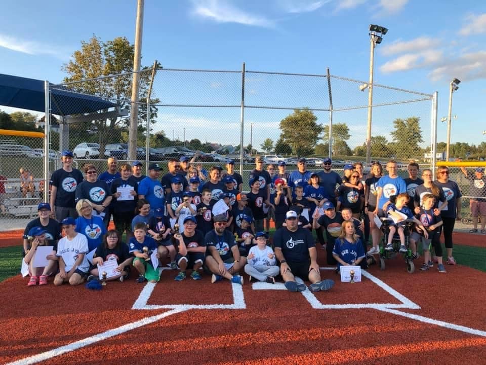 Group photo of Challenger Baseball program participants and volunteers. 