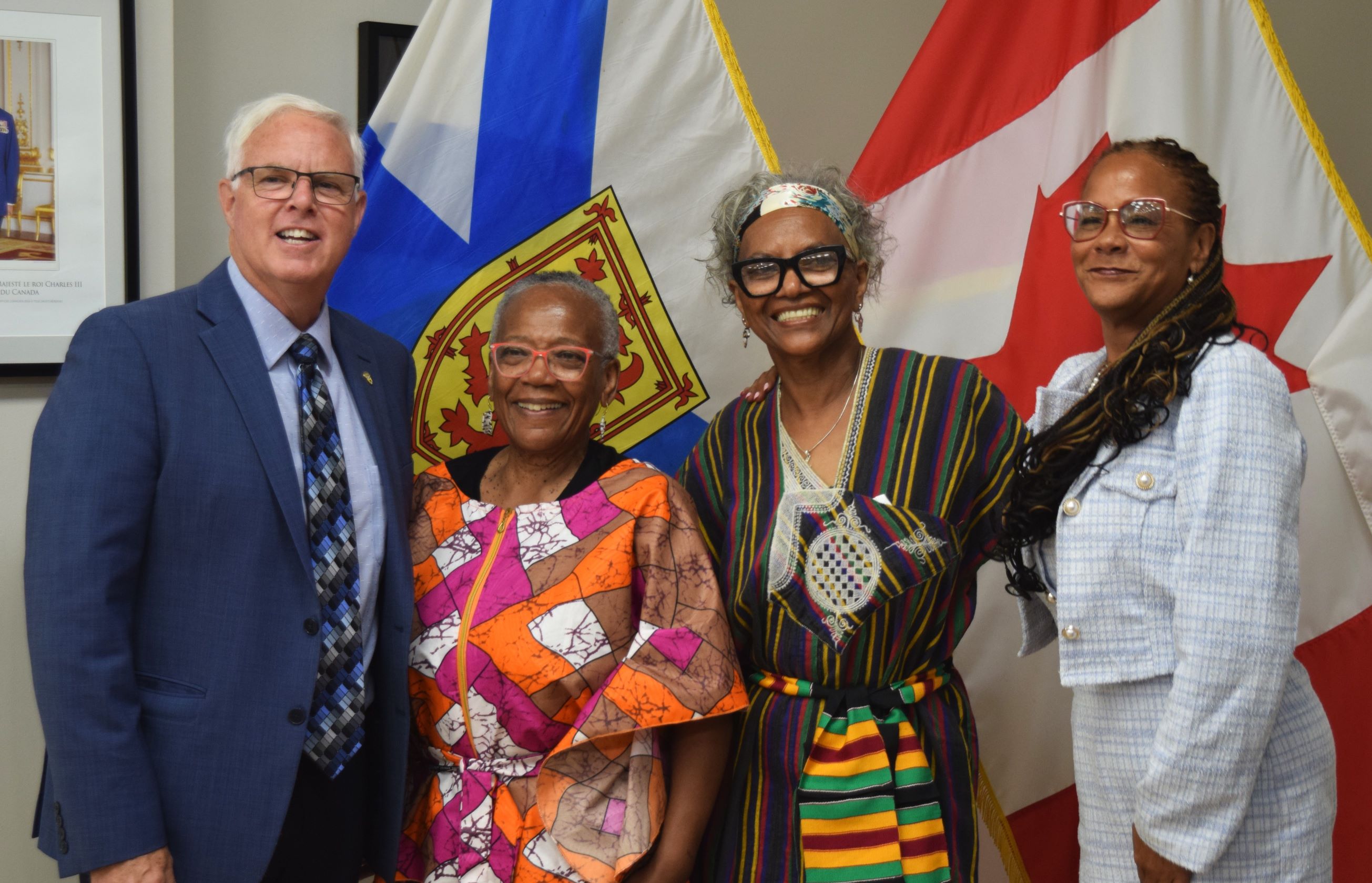 Image with (from left to right) Mayor Sean Cameron, Senator Wanda Thomas Bernard, Lorraine Reddick, and Dr. Wendy Mackey in Antigonish, Nova Scotia