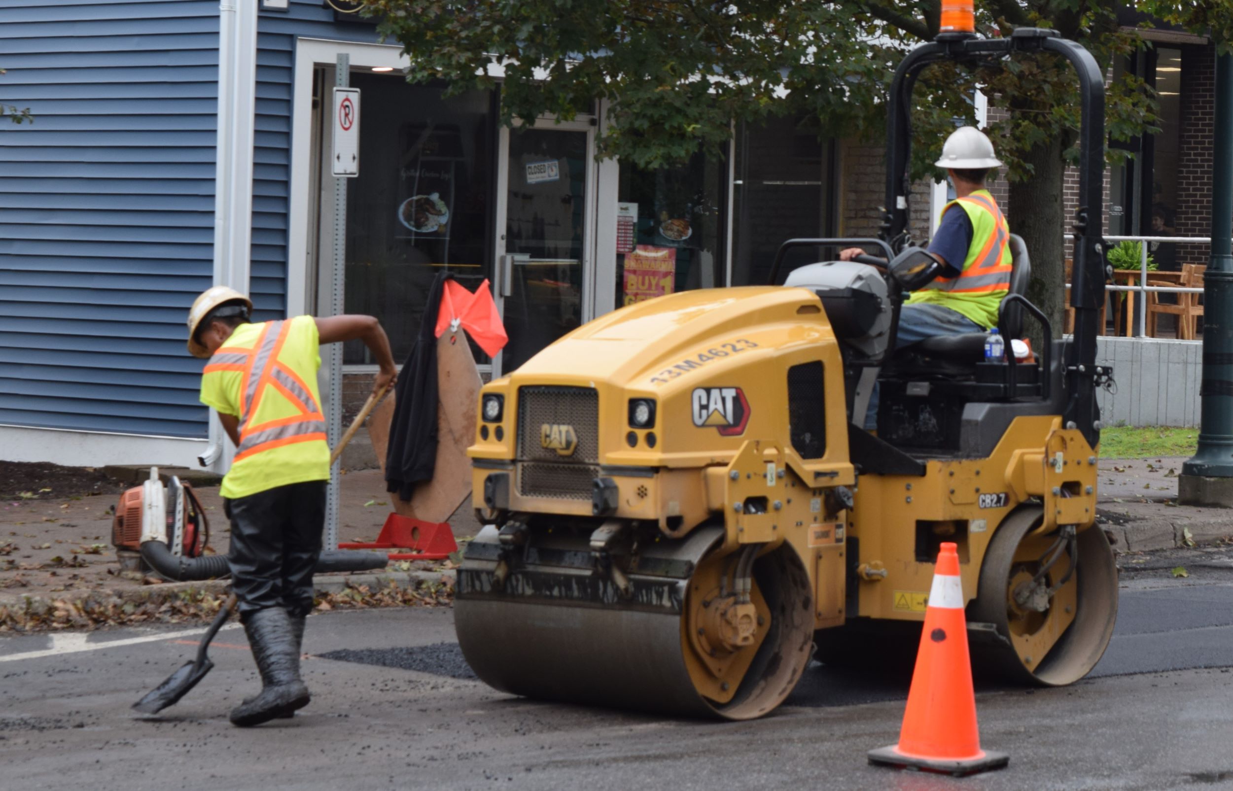 Roller on Main Street Roller finishing an asphalt patch on Main Street in Antigonish