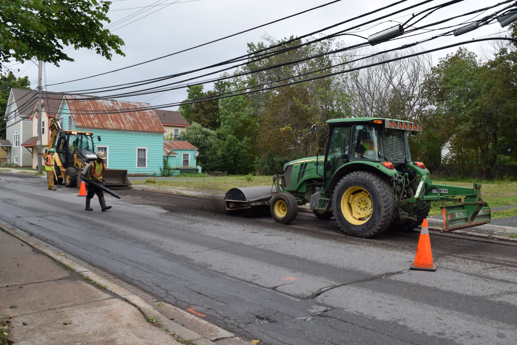 Sweeper and Construction Worker on College Street